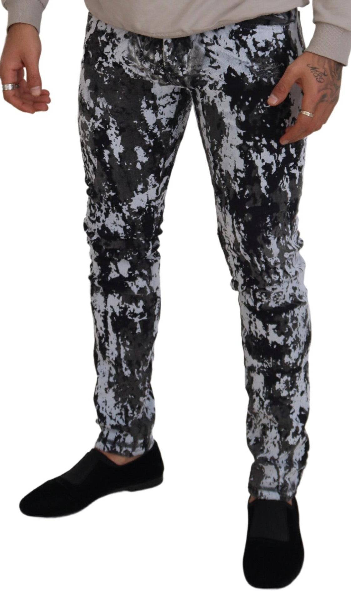 Jeans skinny en denim tie-dye multicolore de Dolce & Gabbana, coton, style tendance avec motif coloré unique.