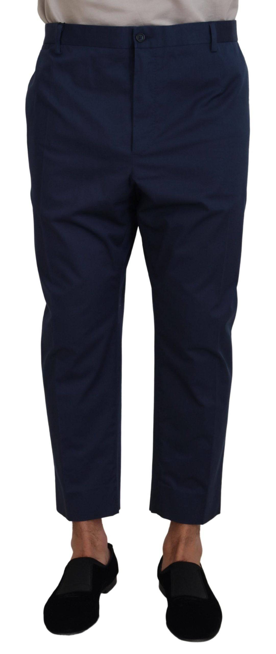 Pantalon homme Dolce & Gabbana en coton bleu, coupe courte, avec détails modernes et style élégant.
