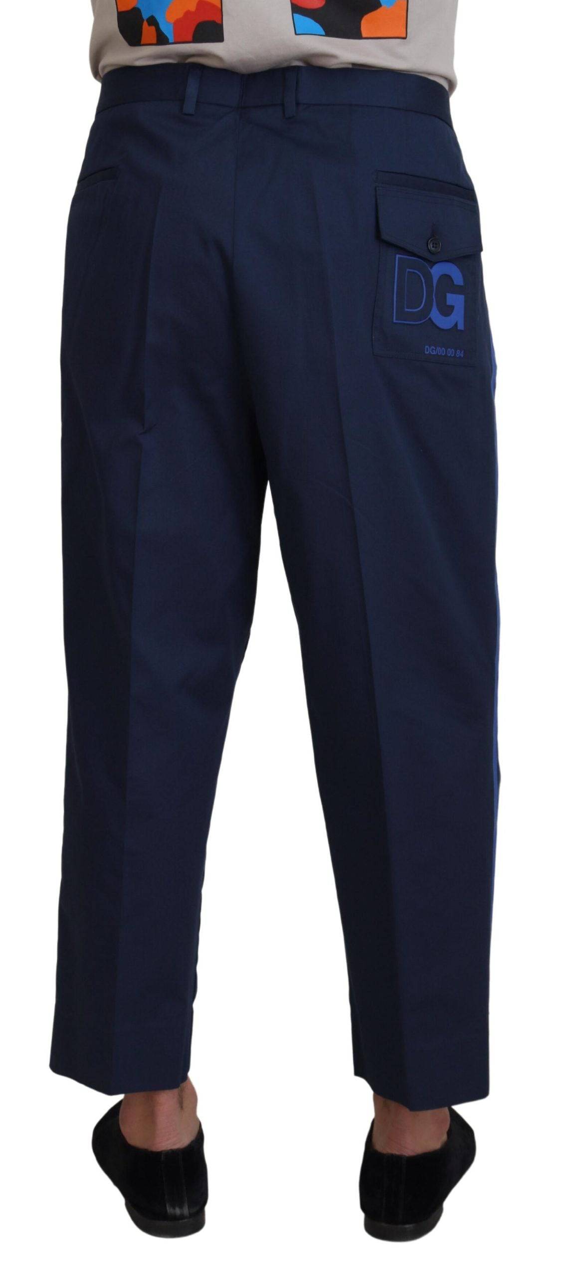 Pantalons hommes Dolce & Gabbana en coton bleu, coupe courte, avec détails modernes et style élégant.