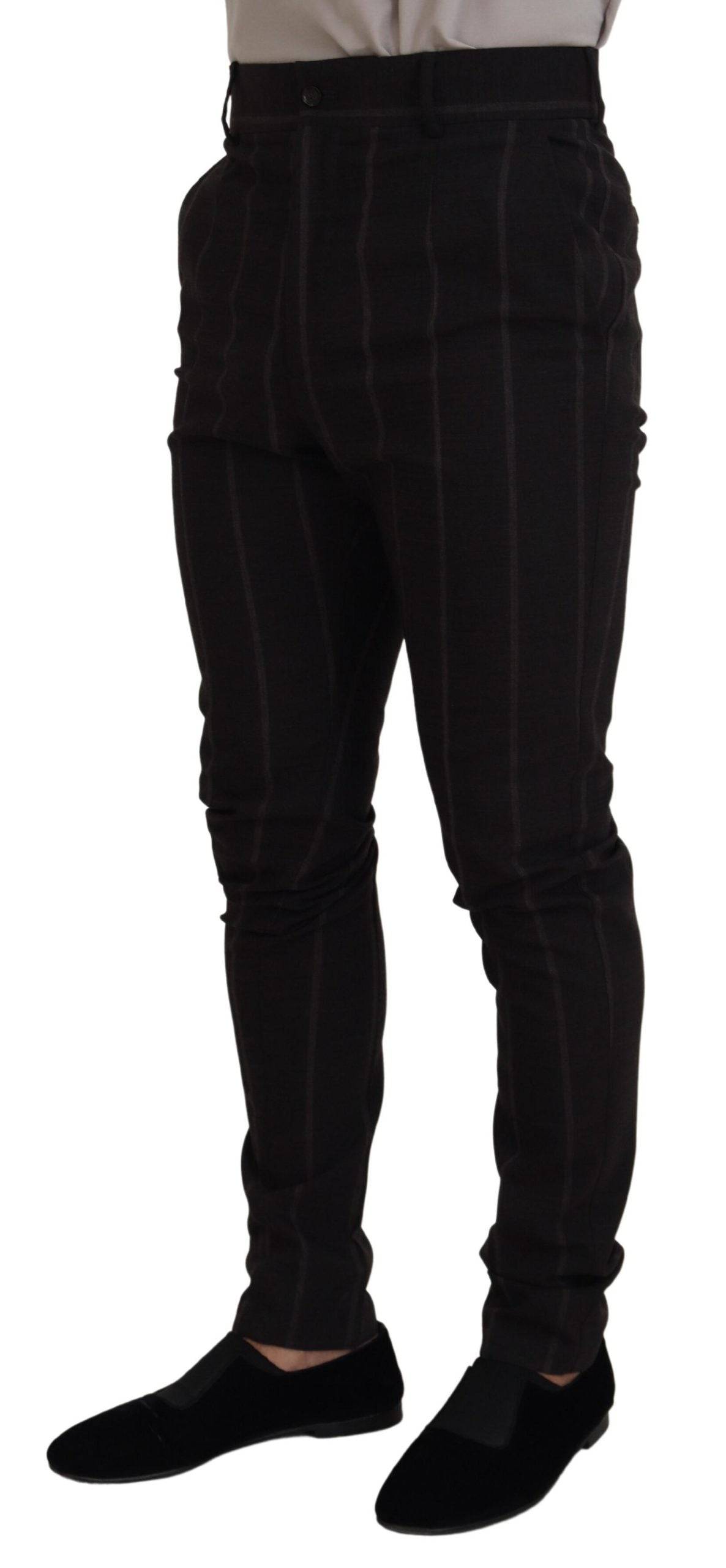 Pantalon homme Dolce & Gabbana en laine noire, style chino formel avec coupe élégante et détails sophistiqués.