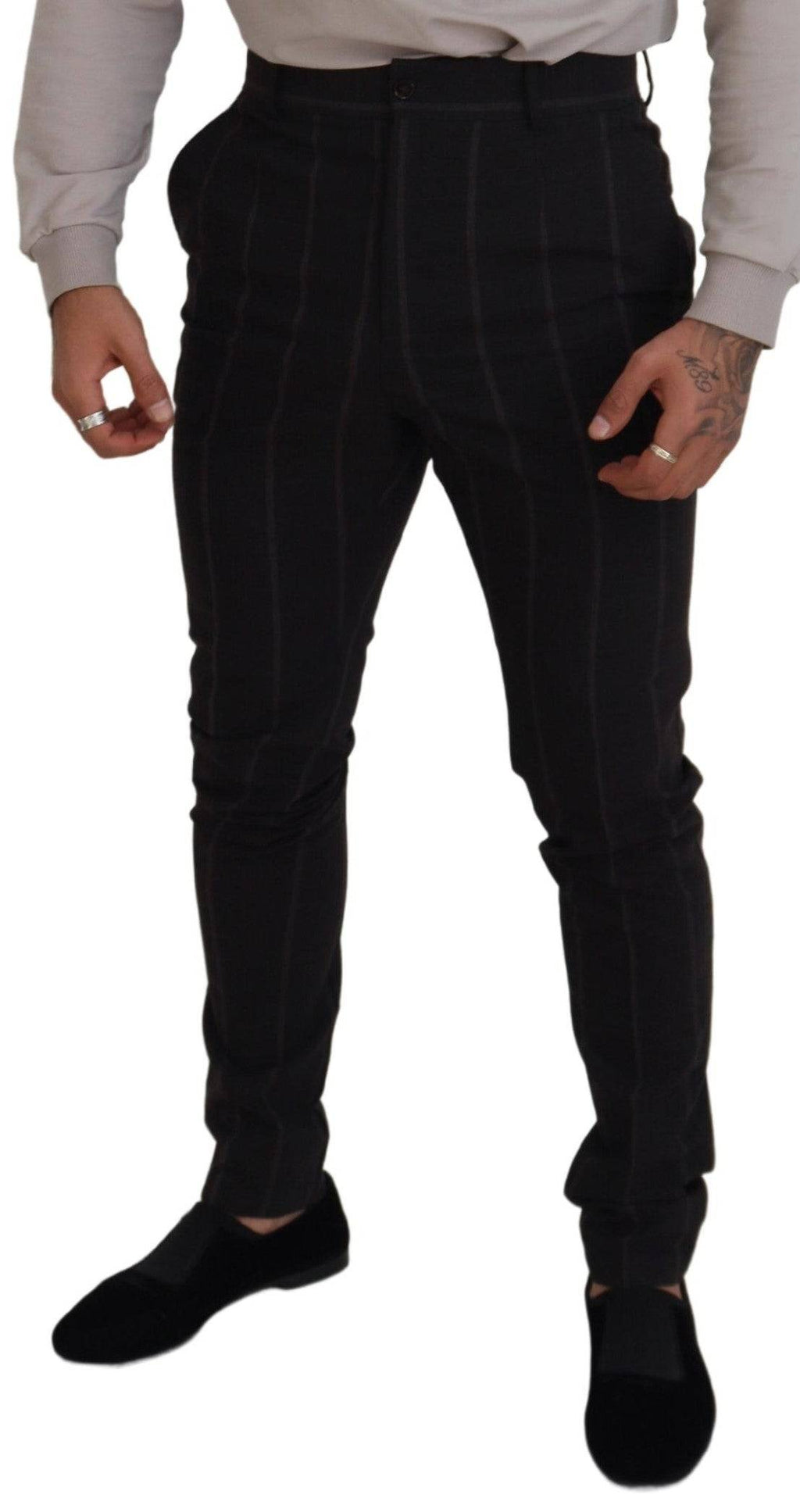 Pantalon homme Dolce & Gabbana en laine noire, style chino formel avec coupe élégante et détails sophistiqués.