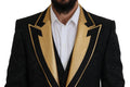 Costume slim fit noir et or Dolce & Gabbana avec détails fantaisie, tuxedo élégant pour homme.
