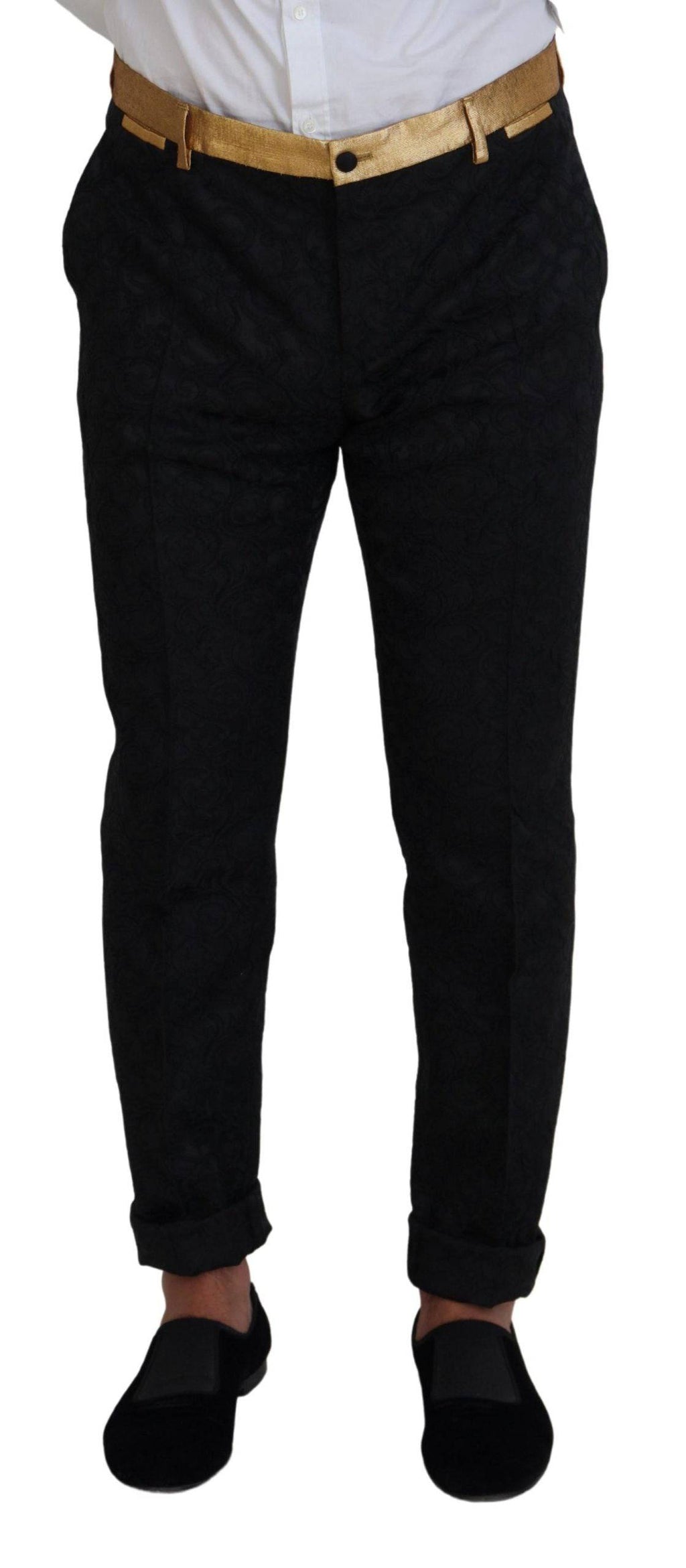 Costume noir et or Dolce & Gabbana, smoking slim fit avec détails élégants, adapté pour occasions formelles.