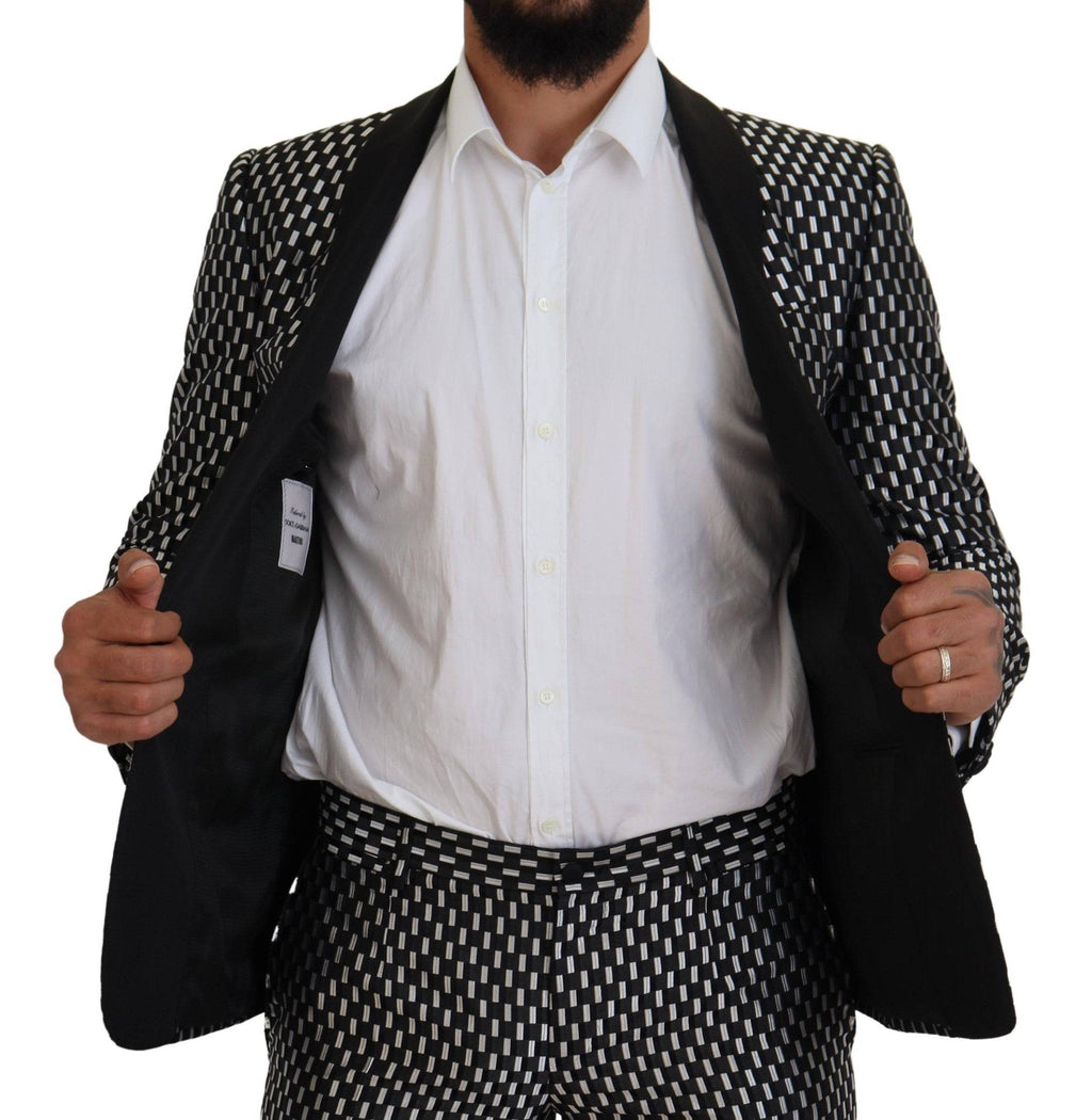 Costume slim en soie noir et blanc Dolce & Gabbana, élégant et ajusté, pour homme.