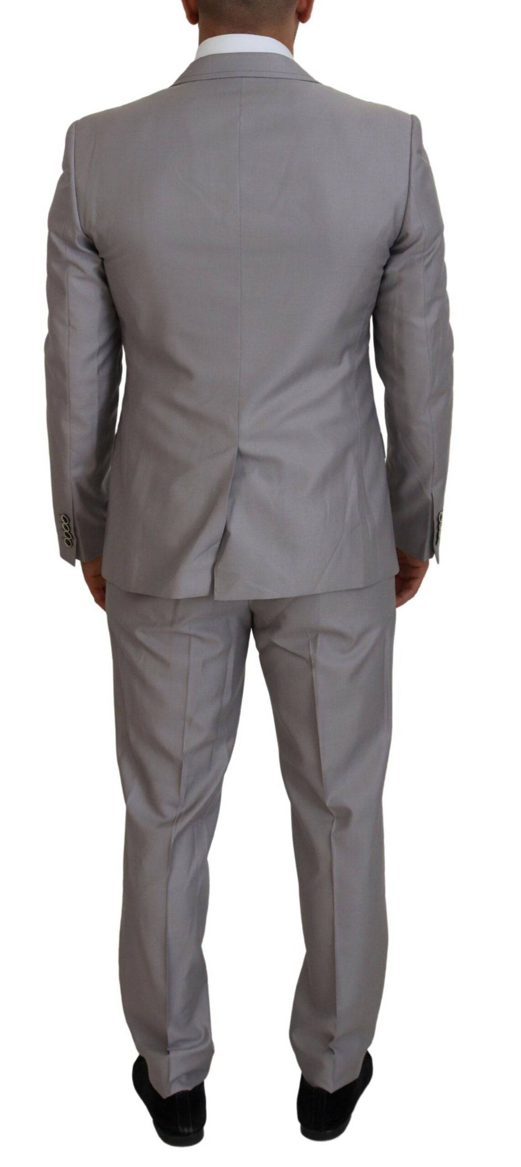 Costume trois pièces en laine et soie argentée Dolce & Gabbana, coupe slim fit, élégant et sophistiqué.