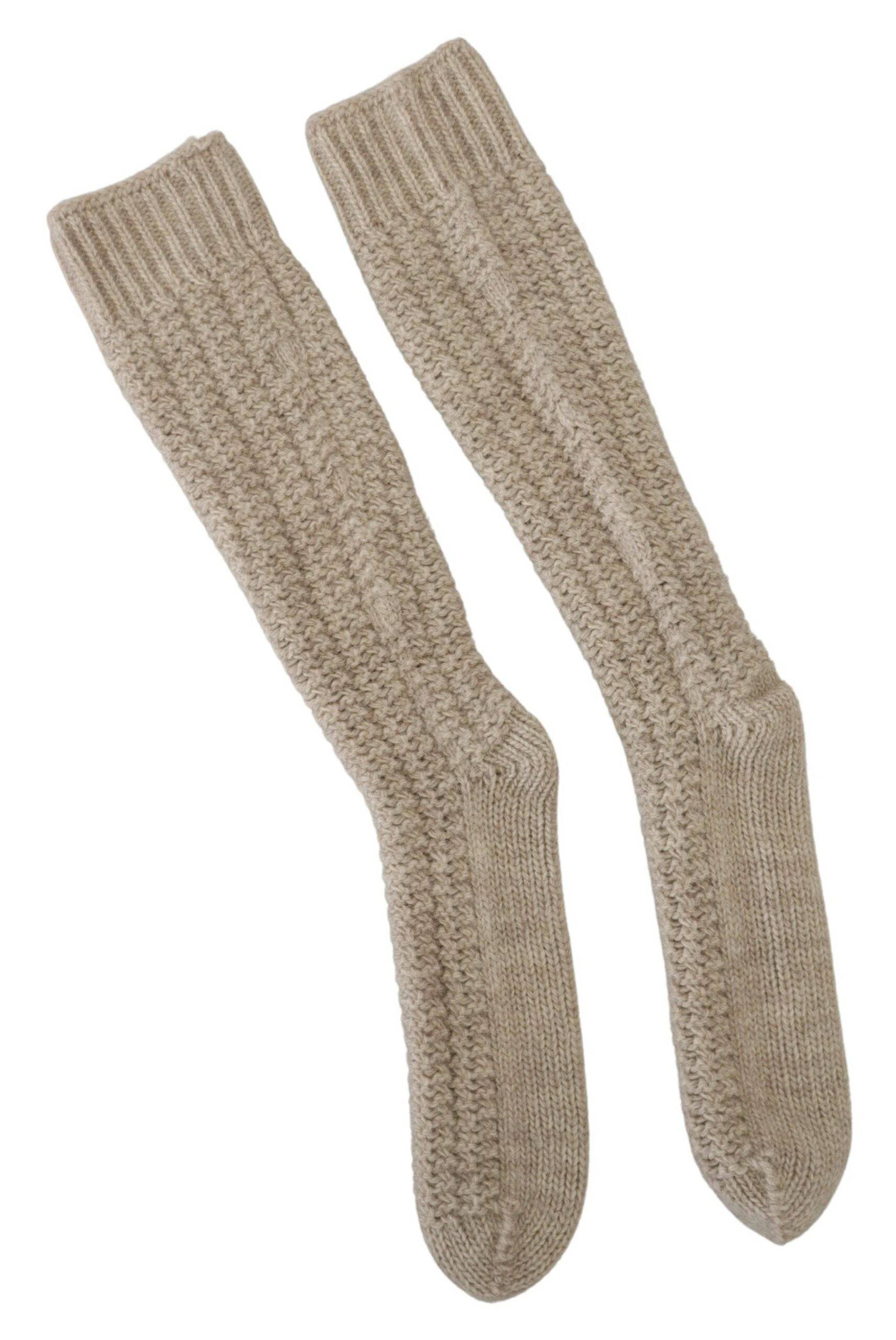 Chaussettes longues en laine beige pour femmes de Dolce & Gabbana, style confortable et élégant, couvrant jusqu'aux mollets.
