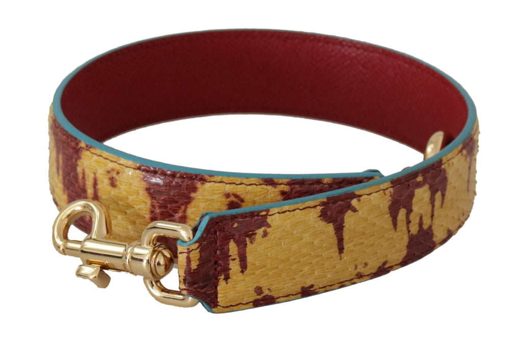 Sangle en cuir jaune et rouge Dolce & Gabbana avec accents en or pour sac à épaule élégant et coloré.