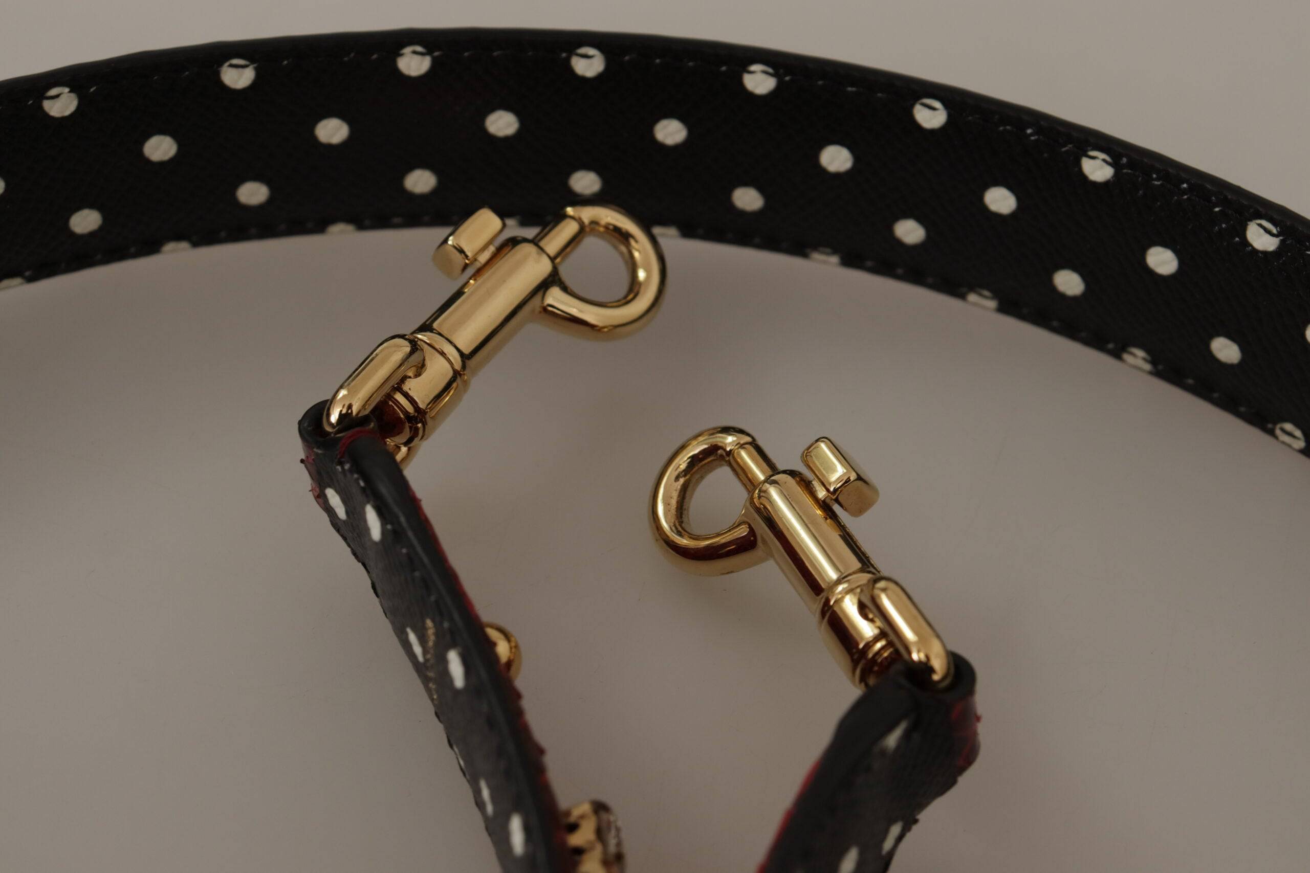 Sangle réversible en cuir de python rouge avec cristaux pour sac Dolce & Gabbana, mode élégante et sophistiquée.