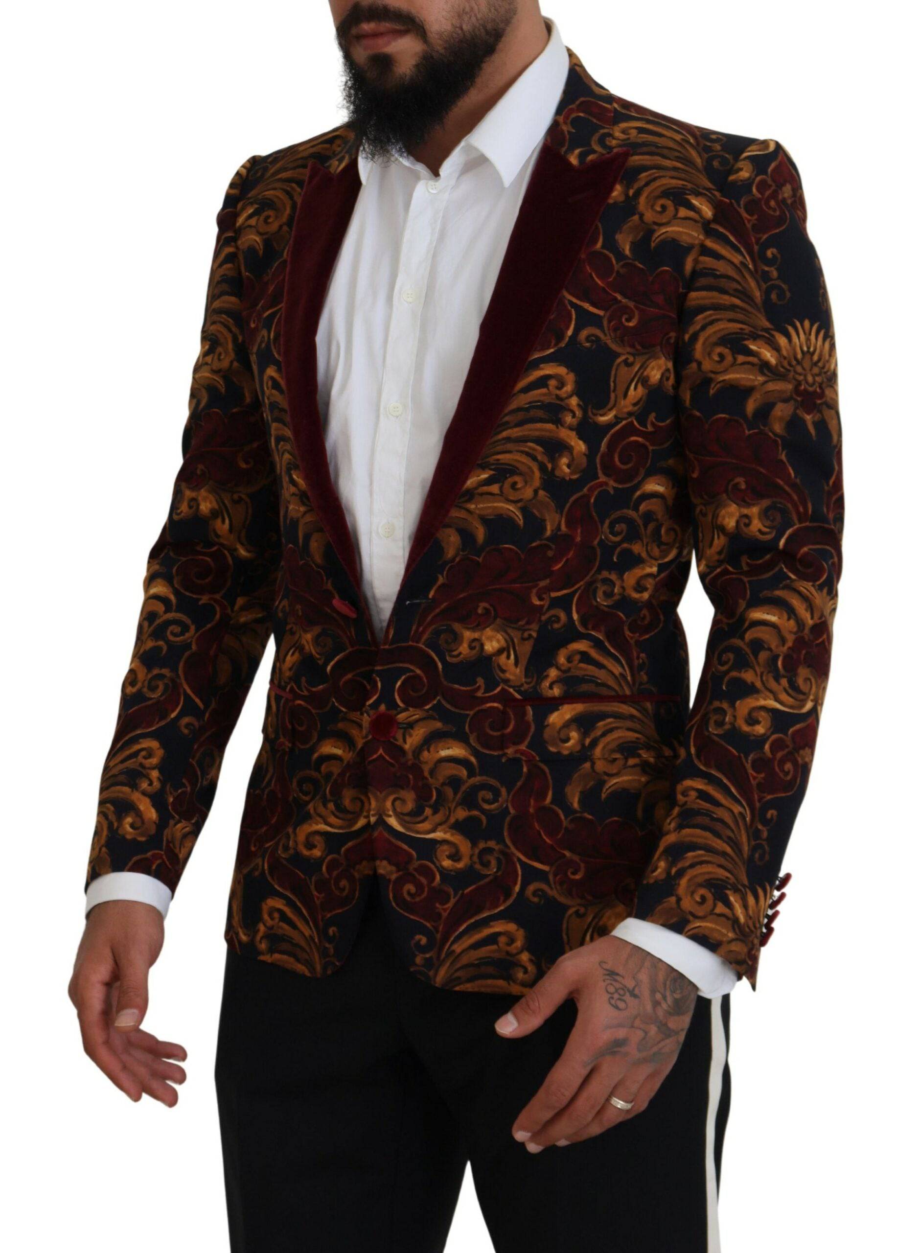 Blazer Martini à fleurs multicolores Dolce & Gabbana, coupe simple, en tissu léger, porté sur un mannequin.