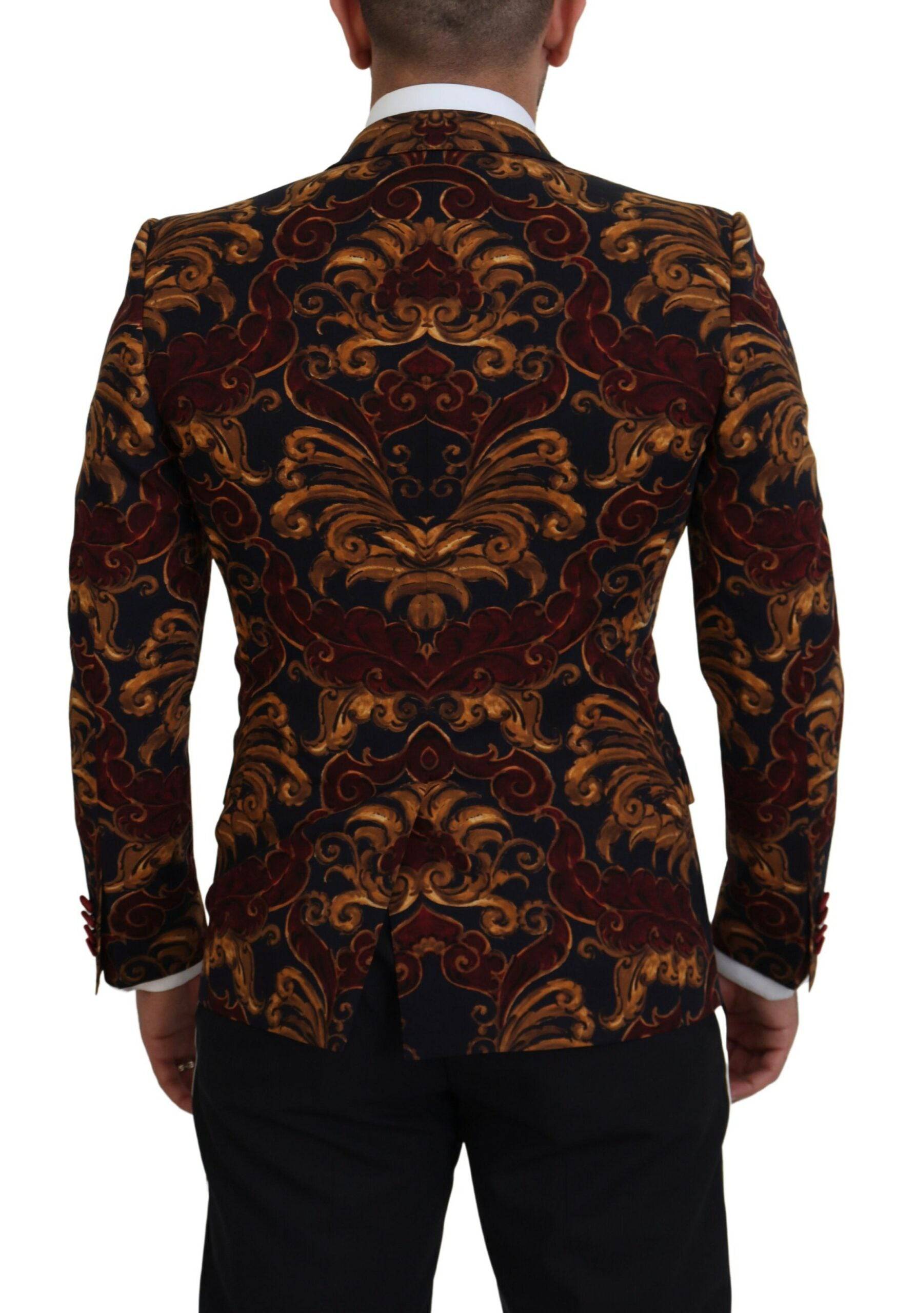 Blazer Dolce & Gabbana à fleurs multicolores, à un bouton, style Martini, coupe ajustée, porté sur un mannequin.