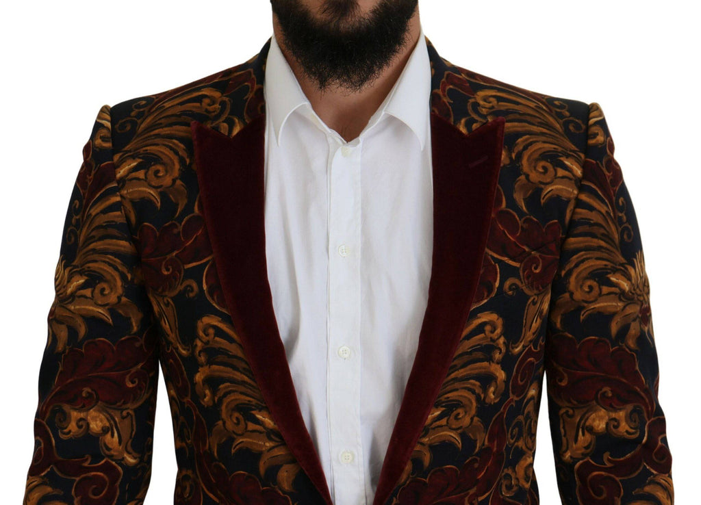 Blazer Martini à fleurs multicolores, Dolce & Gabbana, à simple boutonnage, élégant et coloré, porté sur un mannequin.