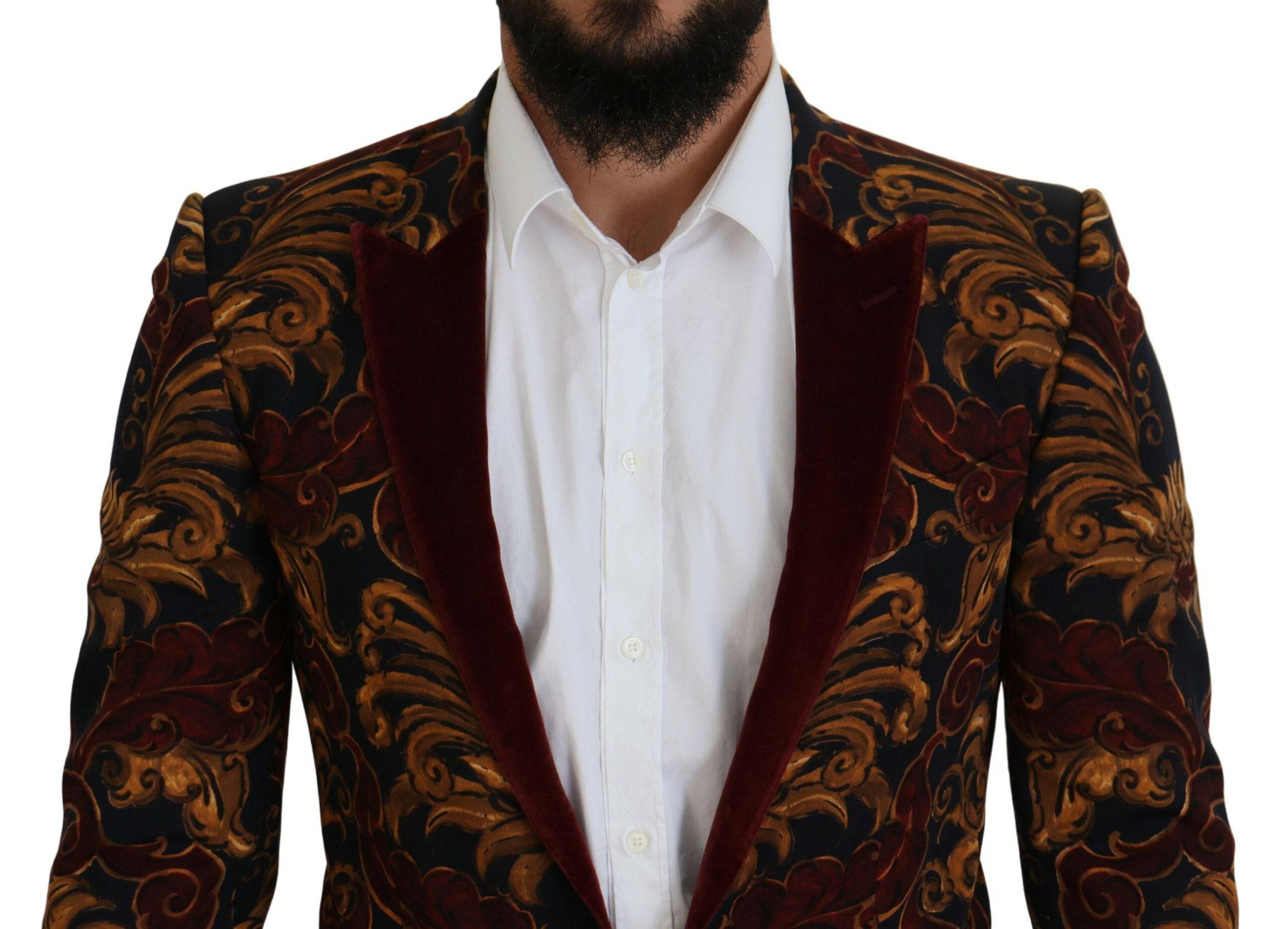 Blazer Martini à fleurs multicolores, Dolce & Gabbana, à simple boutonnage, élégant et coloré, porté sur un mannequin.
