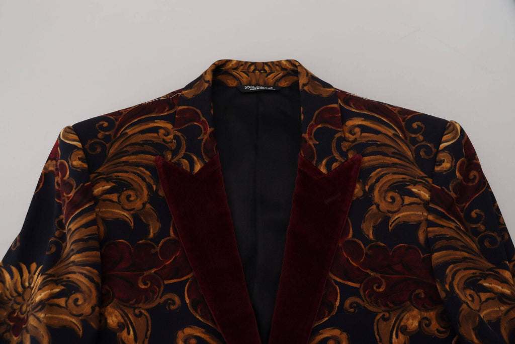 Blazer Martini Dolce & Gabbana à fleurs multicolores, à un bouton, style élégant, porté sur un mannequin.