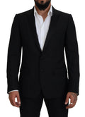 Blazer noir Dolce & Gabbana, coupe slim, veste formelle Martini, détail élégant, tissu de qualité, vue frontale.