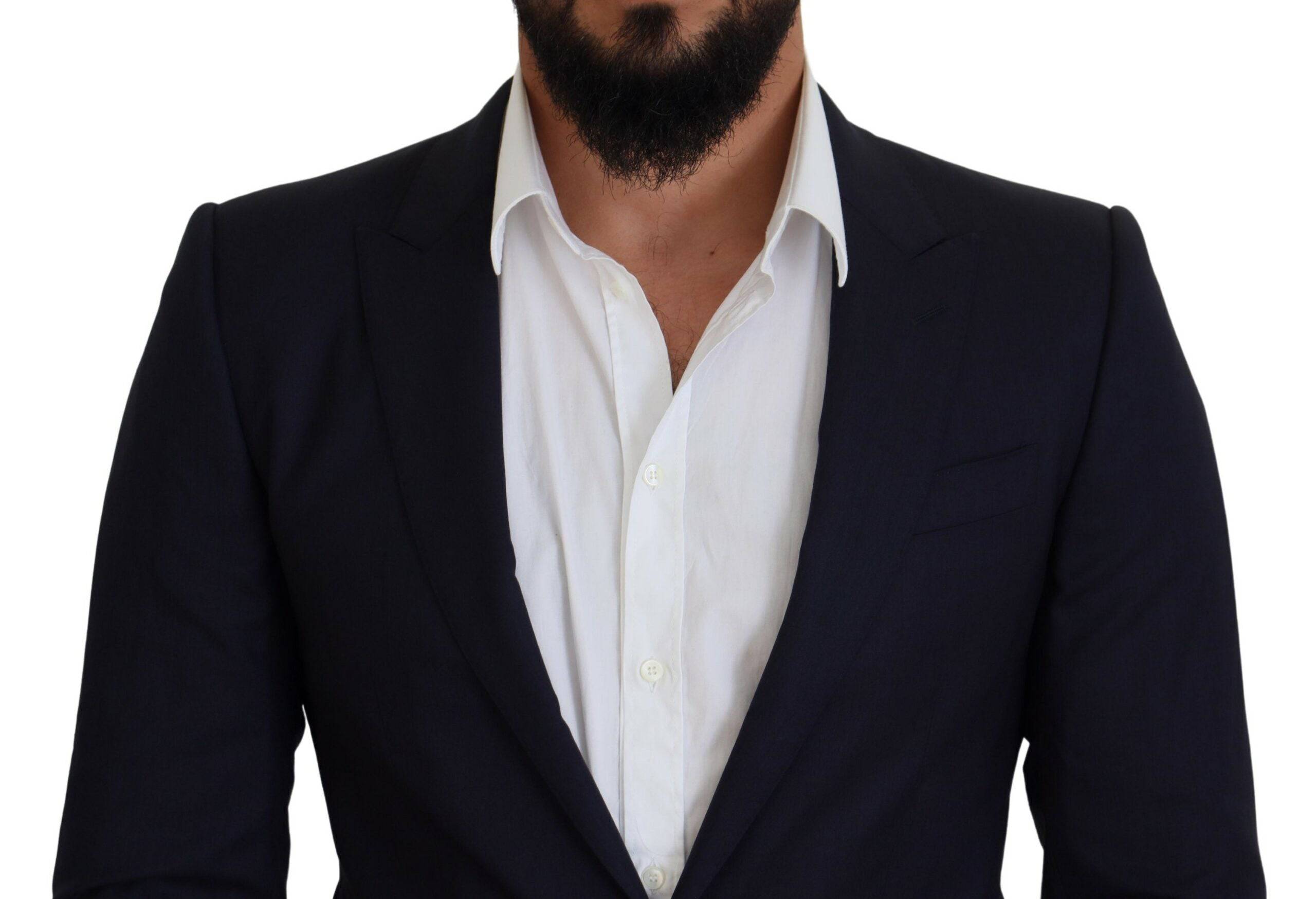 Manteau blazer formel en laine bleue Dolce & Gabbana, coupe slim, élégant et moderne, porté sur un mannequin.