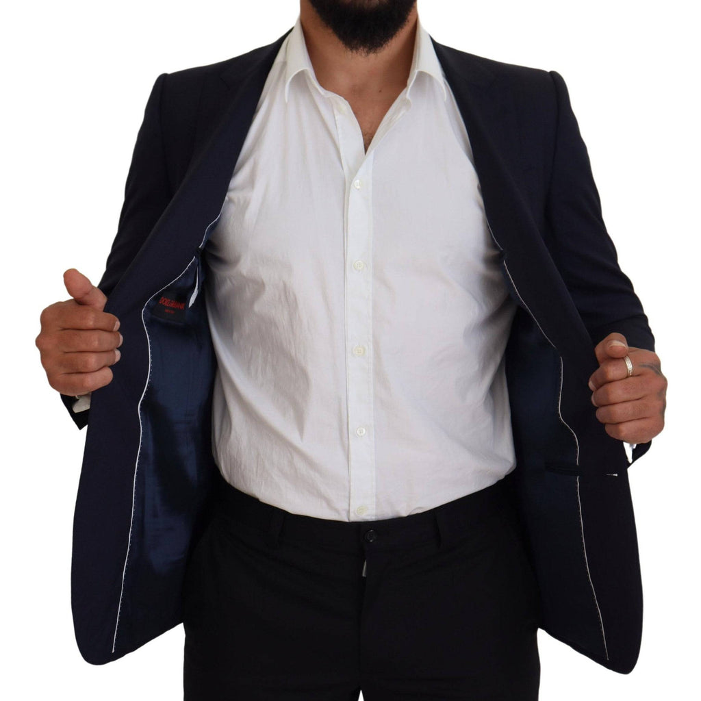 Veste blazer formelle en laine bleue Dolce & Gabbana, coupe slim fit, élégante et sophistiquée, vue de face.