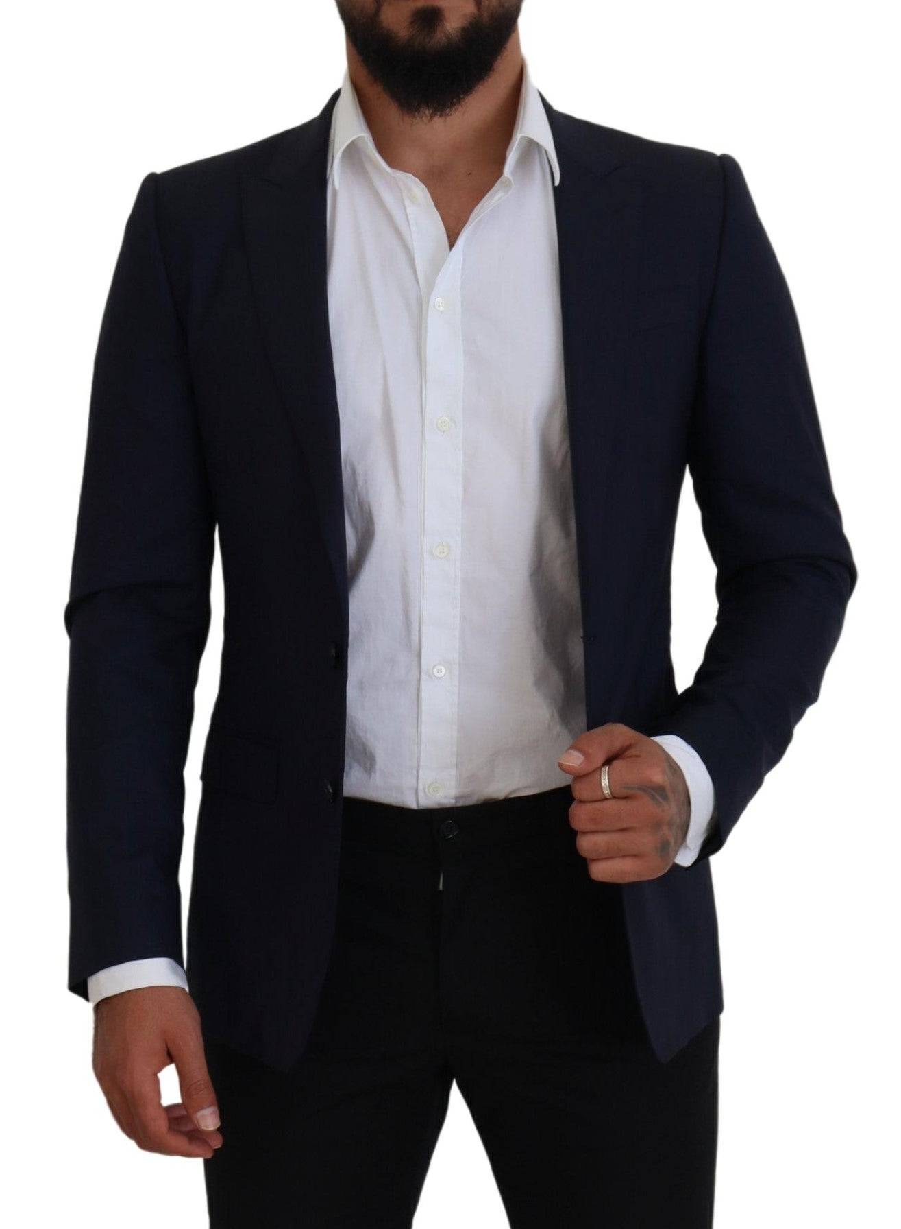 Manteau formel bleu en laine Dolce & Gabbana, blazer slim fit avec col classique et boutons, tissu élégant et sophistiqué.