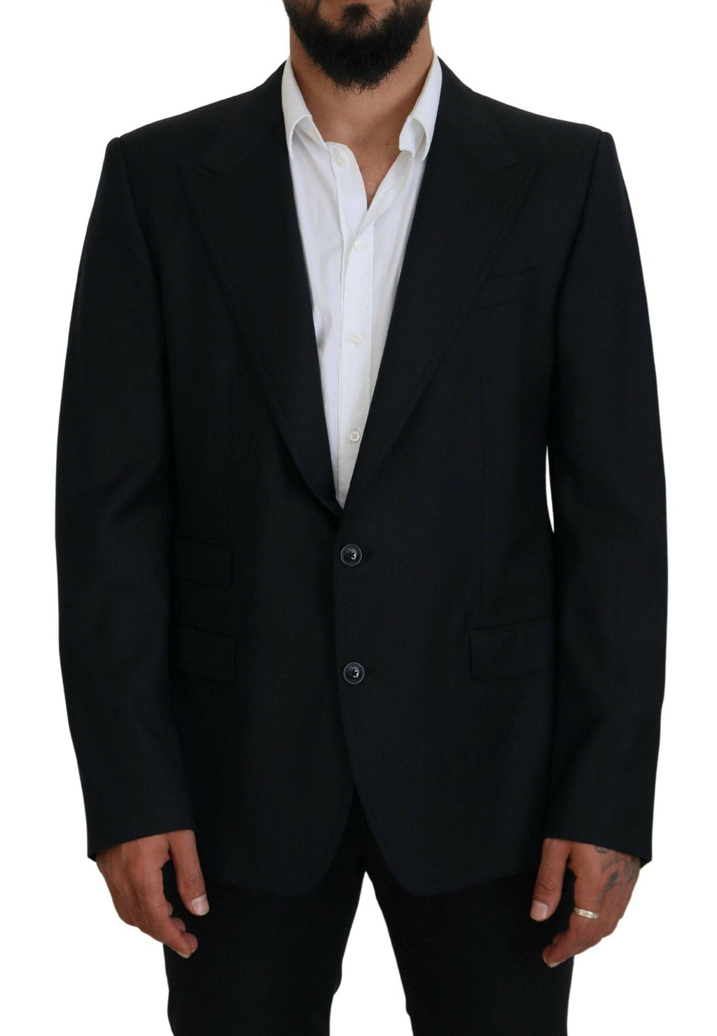 Blazer Dolce & Gabbana en laine bleue foncée, style formel Sicilia, image montrant la coupe élégante et la texture du tissu.