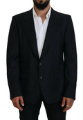 Blazer Dolce & Gabbana en laine bleue foncée, style formel Sicilia, image montrant la coupe élégante et la texture du tissu.