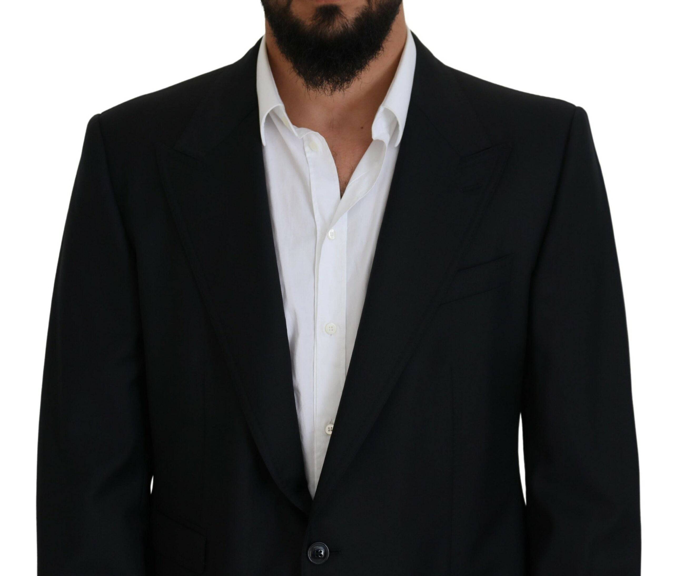 Blazer formel en laine bleu foncé Dolce & Gabbana Sicilia, coupe classique avec revers en satin et poches à rabat.