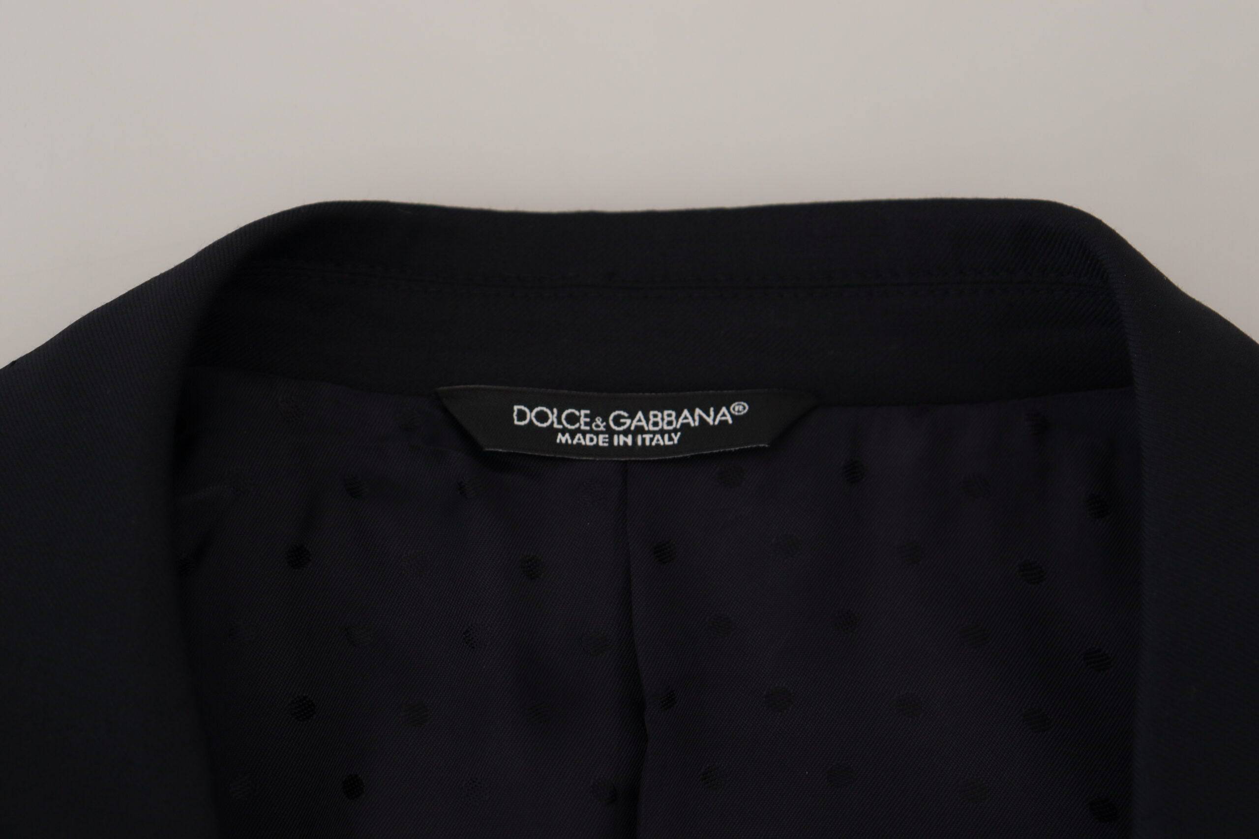 Blazer en laine bleu foncé Dolce & Gabbana Sicilia, de costume formel, avec coupe ajustée et détails élégants.
