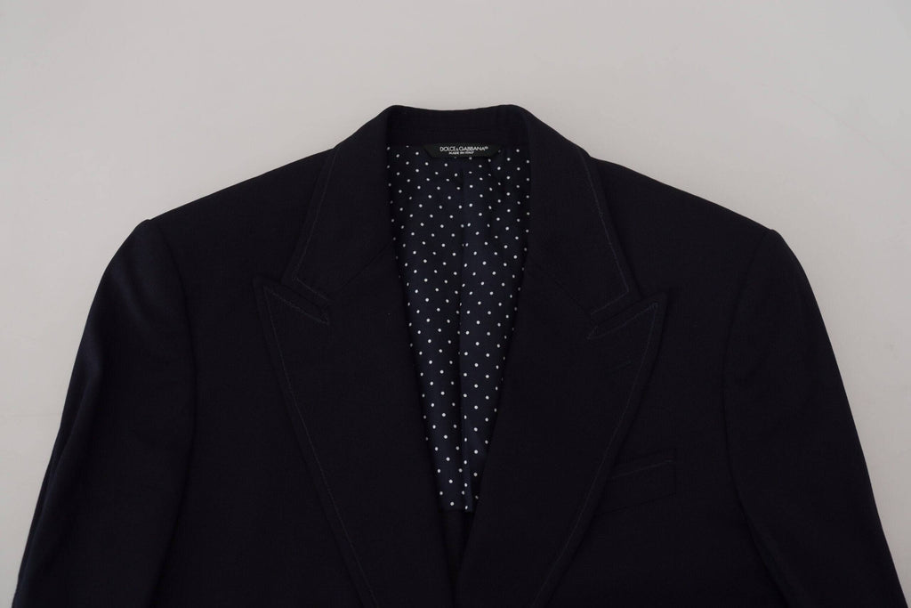 Veste formelle en laine bleue Dolce & Gabbana Taormina, élégante blazer pour homme, détail de couture visible.