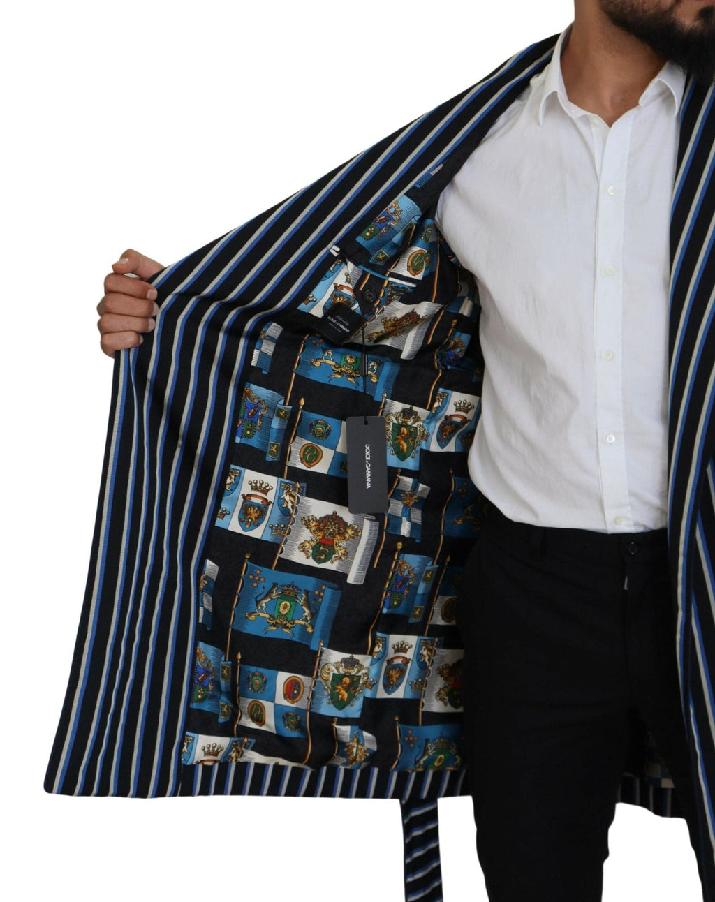 Robe noire et bleue Dolce & Gabbana avec doublure imprimée martini, longueur mi-mollet, style élégant et sophistiqué.