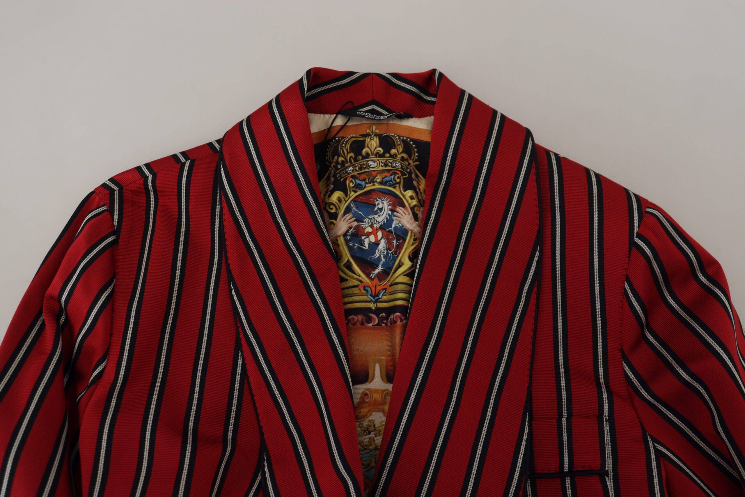 Robe Dolce & Gabbana rouge à rayures avec doublure imprimée Martini, longue et élégante, tissu fluide et sophistiqué.