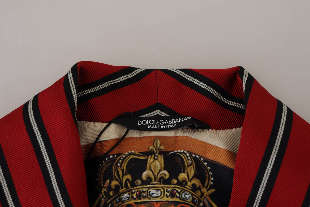 Robe Dolce & Gabbana à rayures rouges avec doublure imprimée Martini, longueur mi-mollet, tissu élégant et sophistiqué.