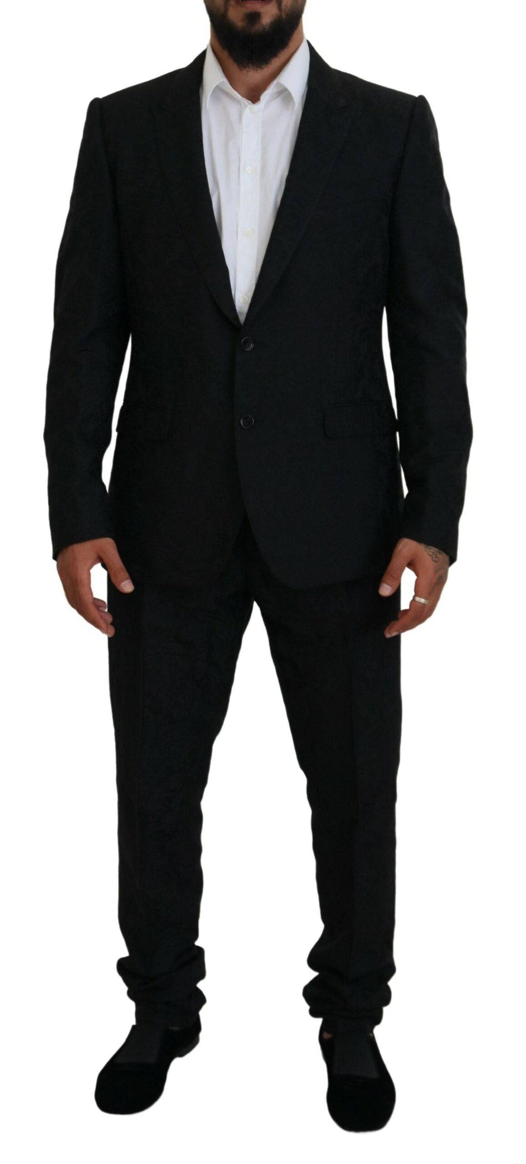 Costume noir Dolce & Gabbana à deux pièces avec veste croisée simple, style élégant et moderne pour homme.