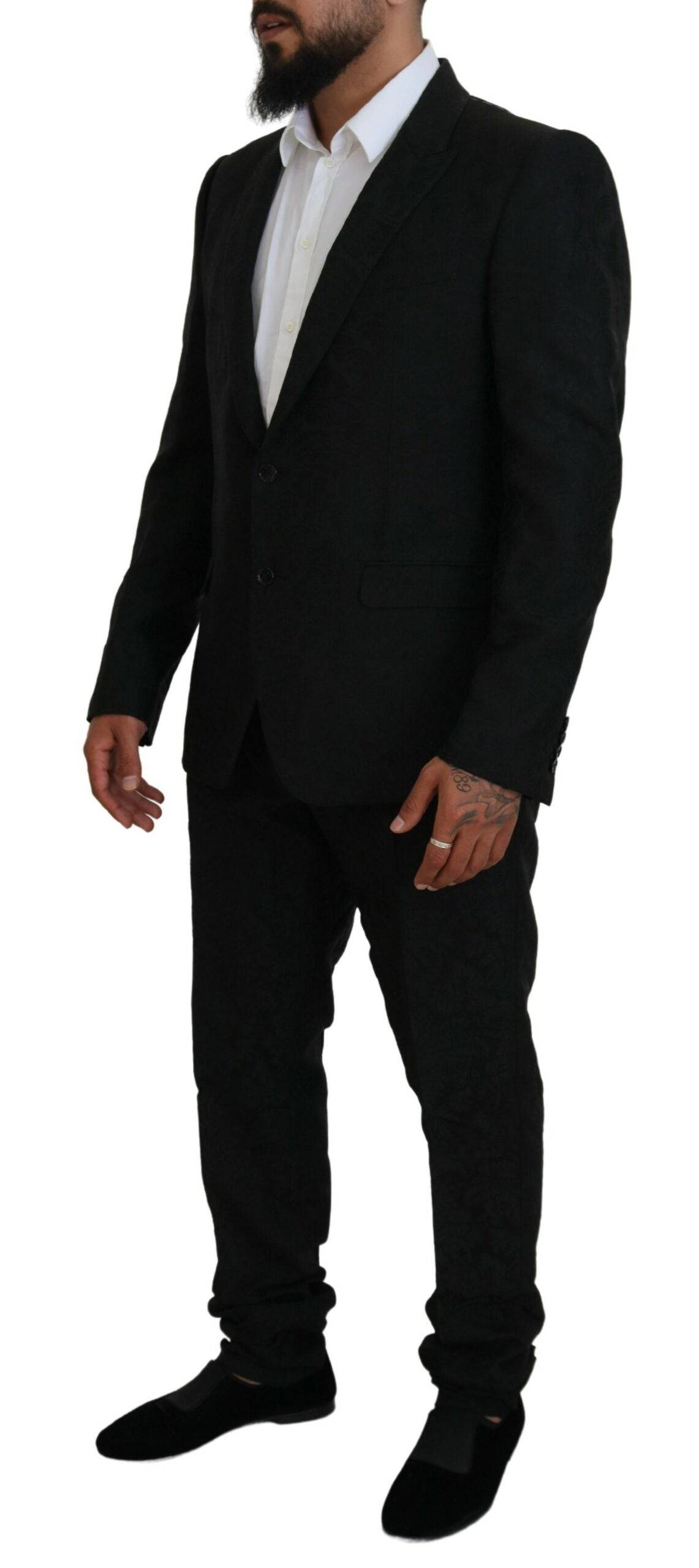 Costume noir à deux pièces Dolce & Gabbana avec veste croisée et pantalon, élégant et sophistiqué.