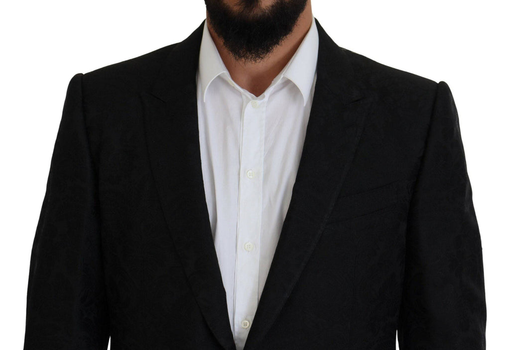 Costume noir Dolce & Gabbana à deux pièces, veste croisée et pantalon, style Martini élégant pour homme.