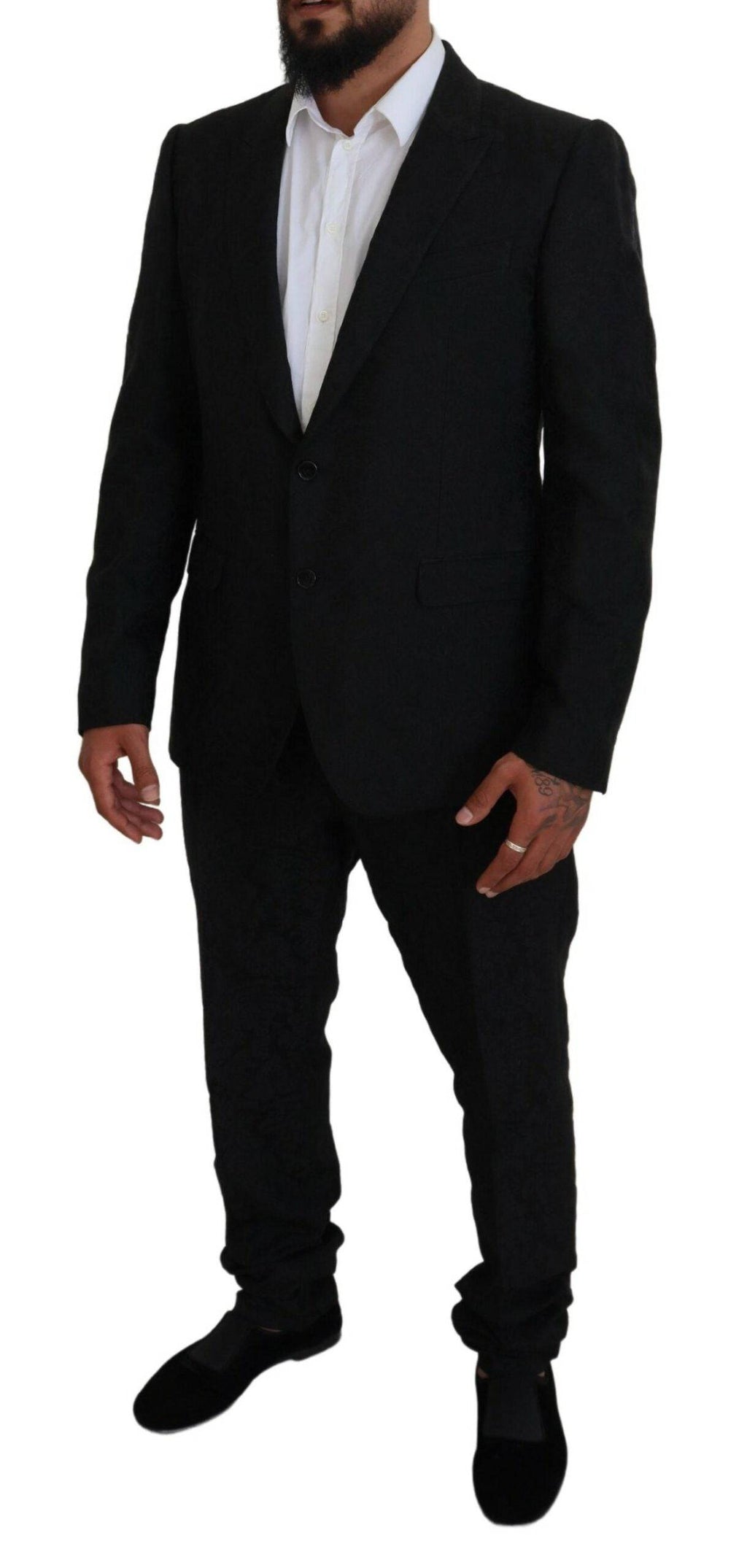 Costume deux pièces noir Dolce & Gabbana, veste croisée simple boutonnage et pantalon élégant, pour homme.