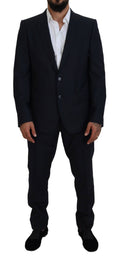 Costume deux pièces Dolce & Gabbana bleu à boutons avec veste croisée pour homme, élégant et moderne.