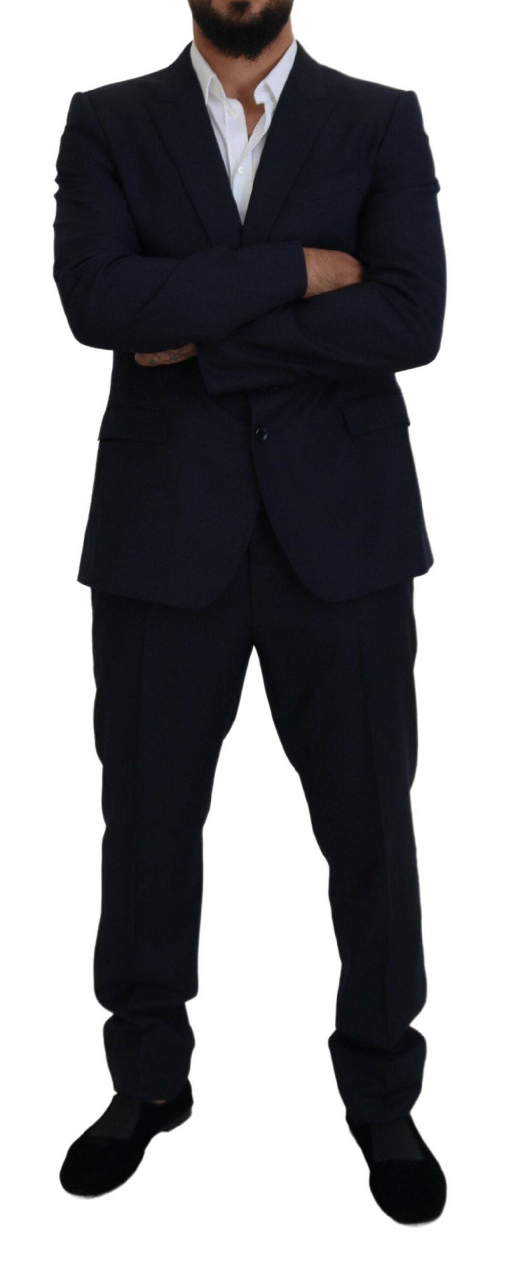 Costume deux pièces Dolce & Gabbana Bleu à col britannique, veste à un bouton et pantalon assorti, élégant et classique.