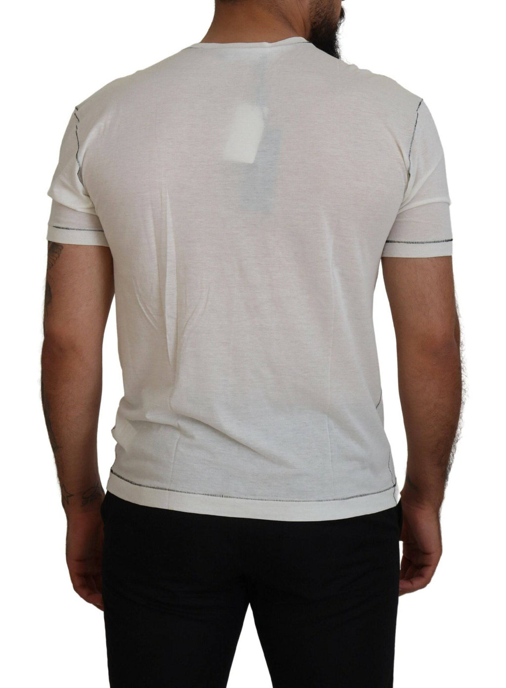 T-shirt homme blanc à manches courtes Dolce & Gabbana avec imprimé floral et logo visible sur le devant.