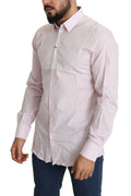 Chemise formelle en coton rose clair Dolce & Gabbana avec détails dorés visible sur cette image.