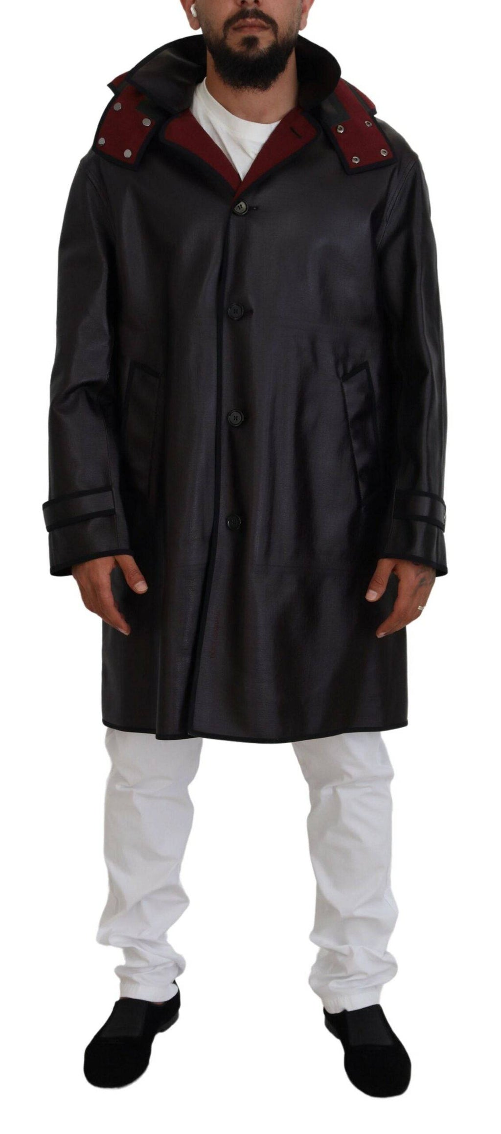 Veste trench noire Dolce & Gabbana avec capuche, en coton, style parka, visible avec détails de couture et fermeture éclair.