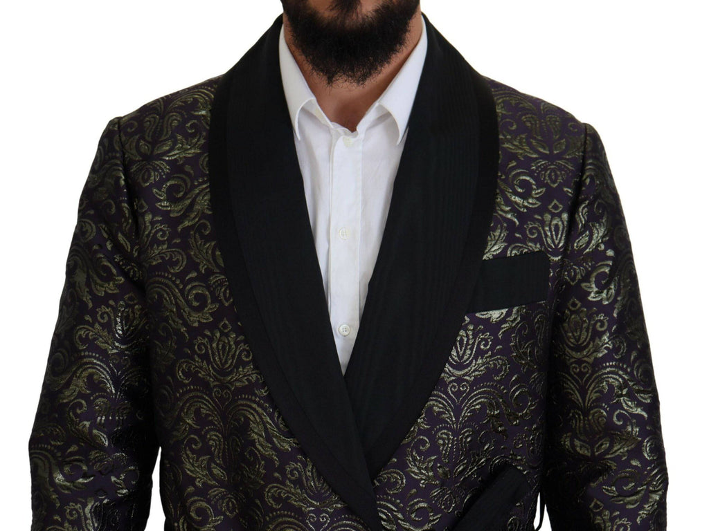 Veste élégante Dolce & Gabbana en or et violet avec motif baroque, blazer ou robe sophistiquée, détail visible sur l'image.