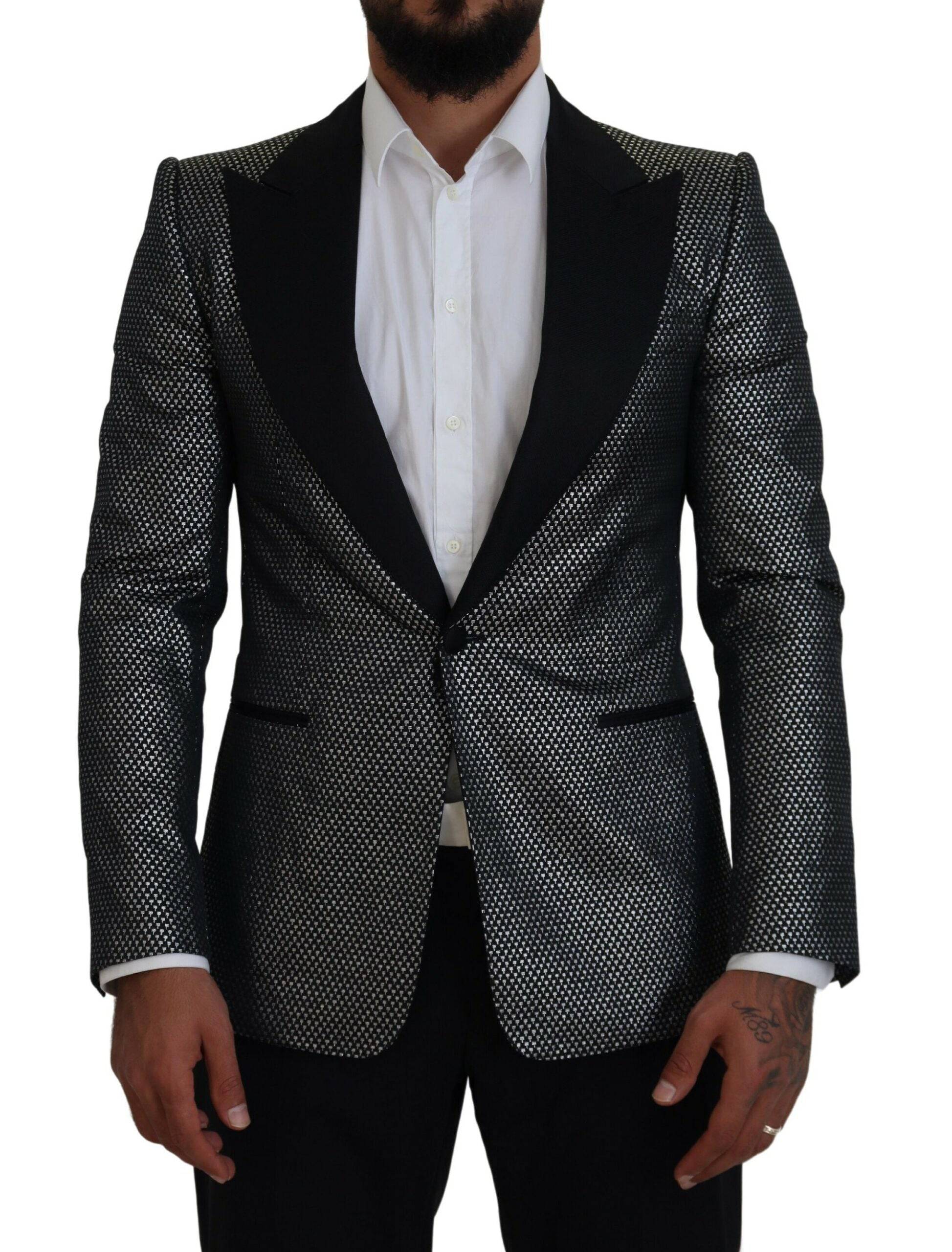 Veste blazer Dolce & Gabbana en jacquard noir et argent, coupe slim fit, élégante et sophistiquée, détail de la texture en tissu.