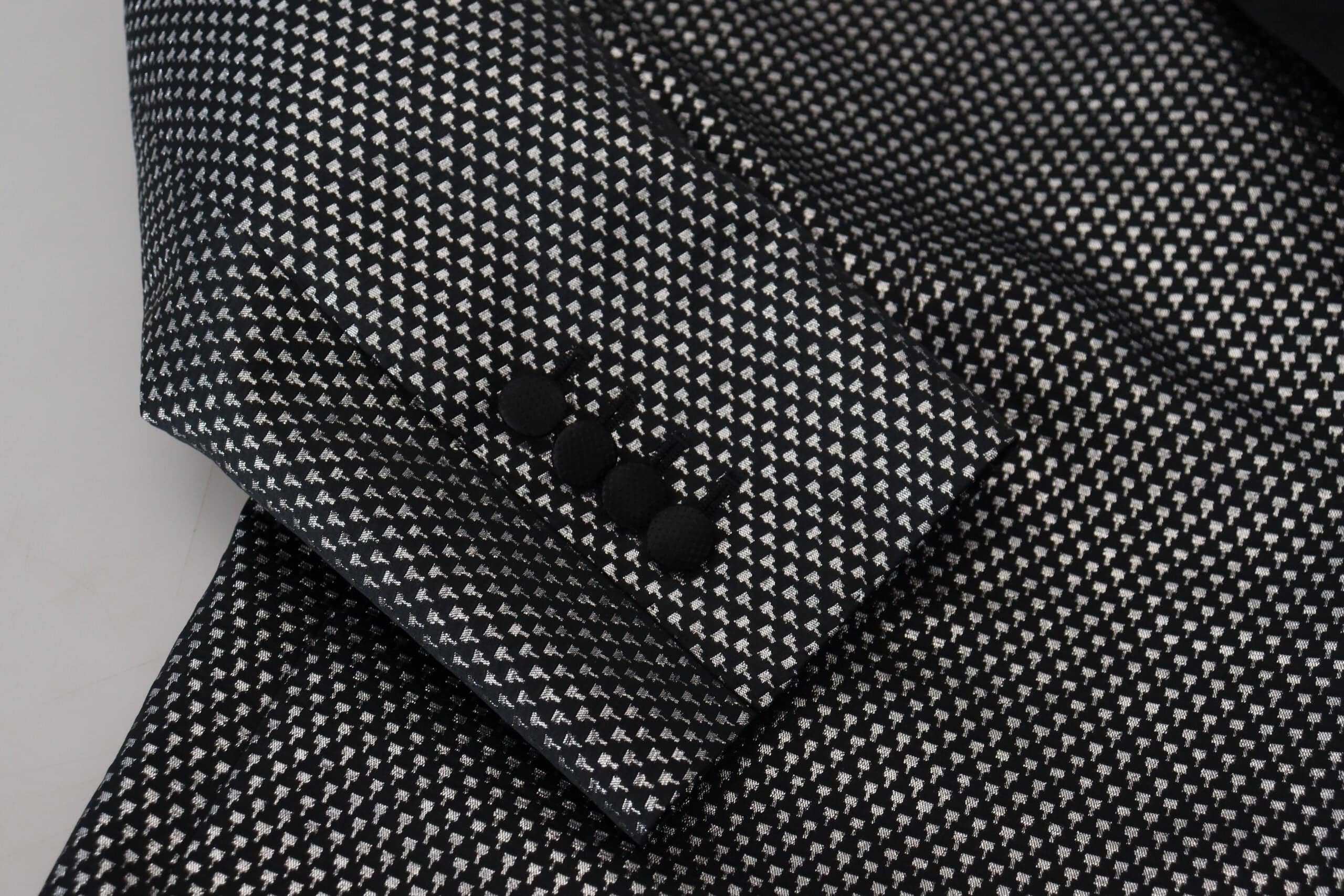 Veste blazer Dolce & Gabbana en jacquard noir et argent, coupe slim fit, élégante et sophistiquée.