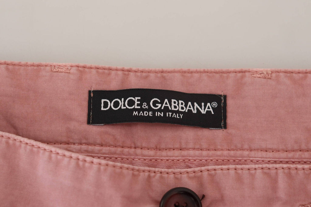 Shorts décontractés pour homme Dolce & Gabbana en coton rose, chinos élégants et confortables pour un style casual.