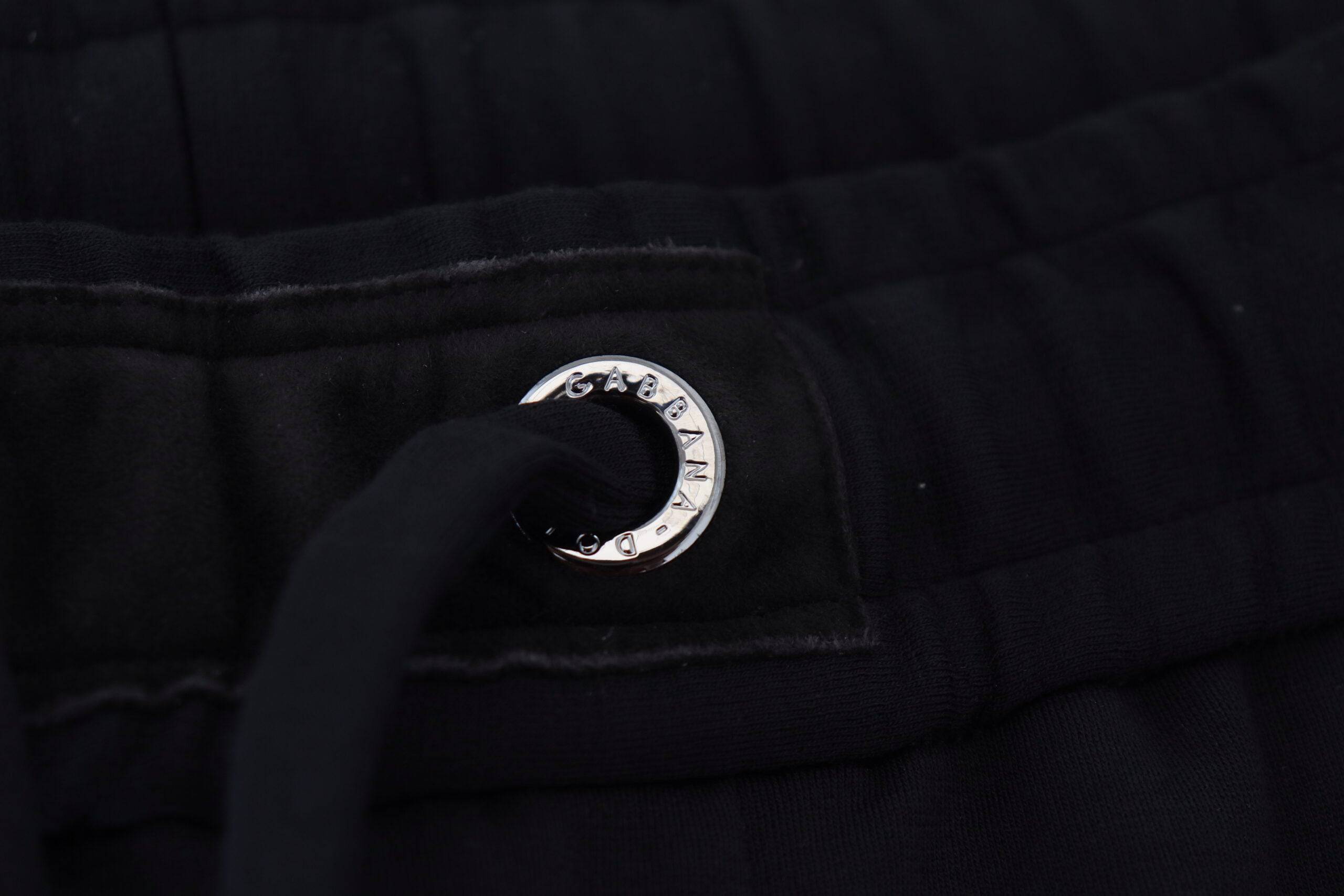 Pantalon de sport pour homme Dolce & Gabbana en laine noire, style décontracté, avec ceinture élastique et poches latérales.