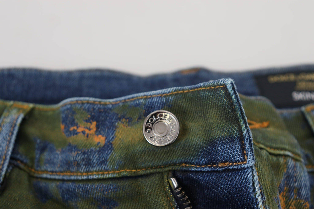 Jeans skinny en coton denim bleu vert de Dolce & Gabbana, ajustés et tendance, visibles en gros plan.