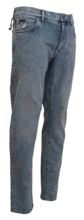 Jeans en jean en coton bleu Dolce & Gabbana, coupe slim fit, visibles détails et texture du tissu.