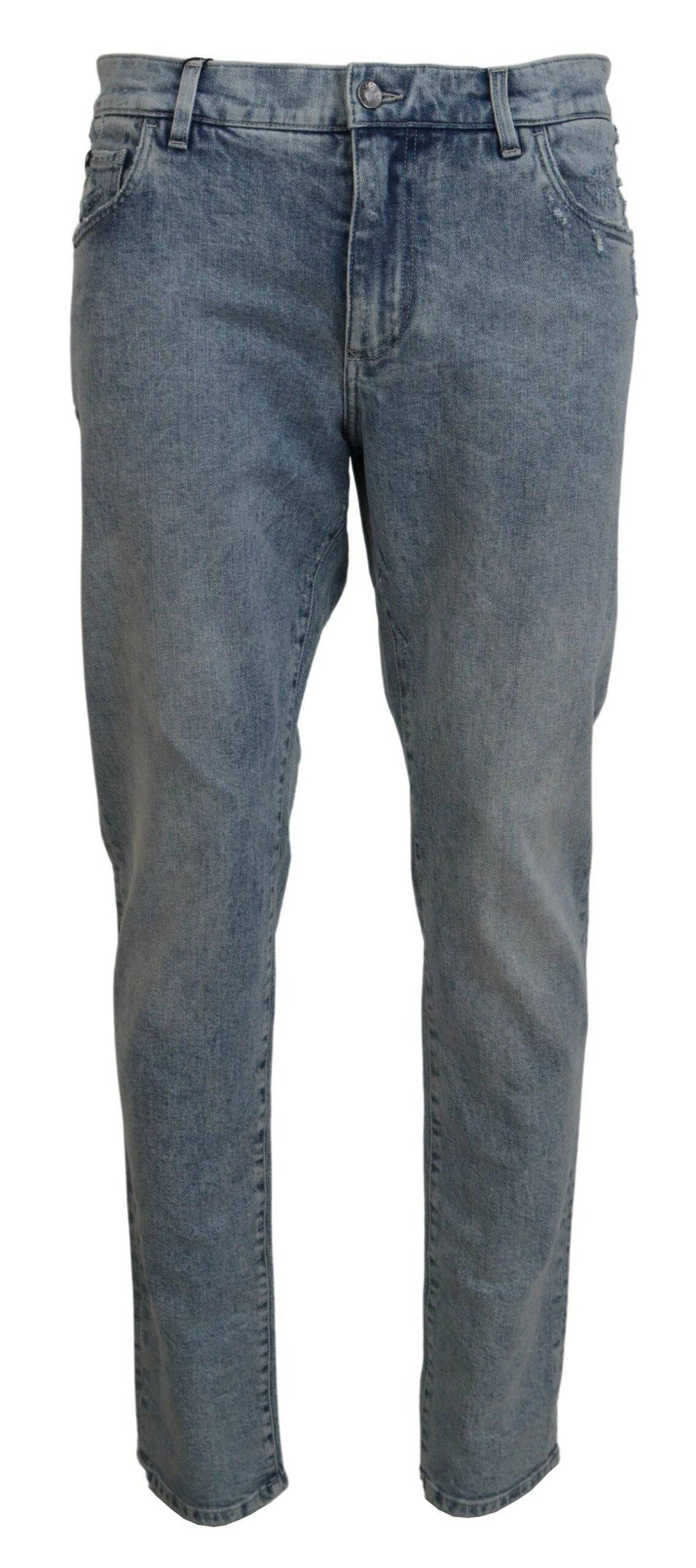Jeans slim fit en denim coton bleu Dolce & Gabbana, visibles avec ceinture et détails de couture.