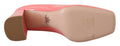 Escarpins Prada en cuir verni rose, talons blocs classiques, chaussures élégantes pour femmes.