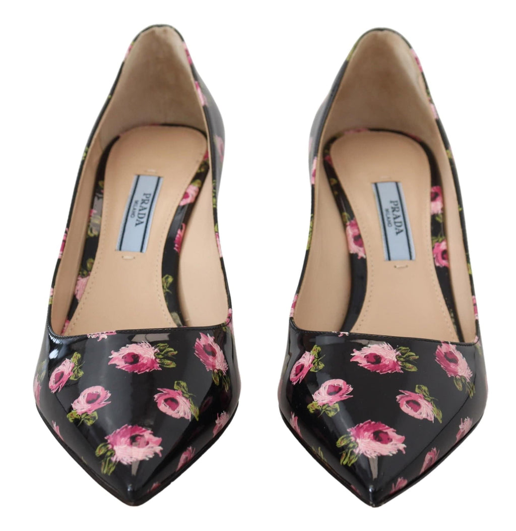Escarpins Prada en cuir noir avec motifs floraux, talons aiguille et style élégant pour femmes.