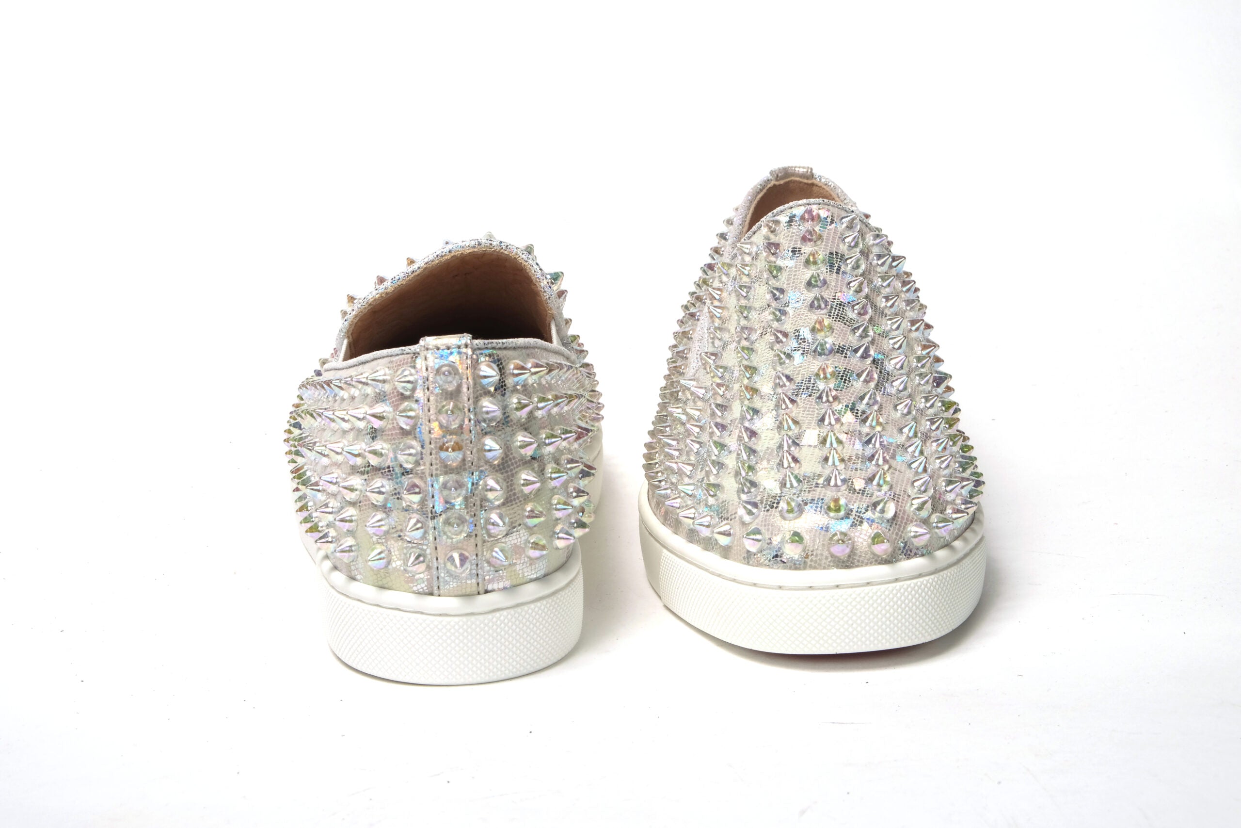 Chaussures plates Christian Louboutin Ab Roller Boat pour femme, en blanc avec détails en ab et clair, style sneaker décontracté.