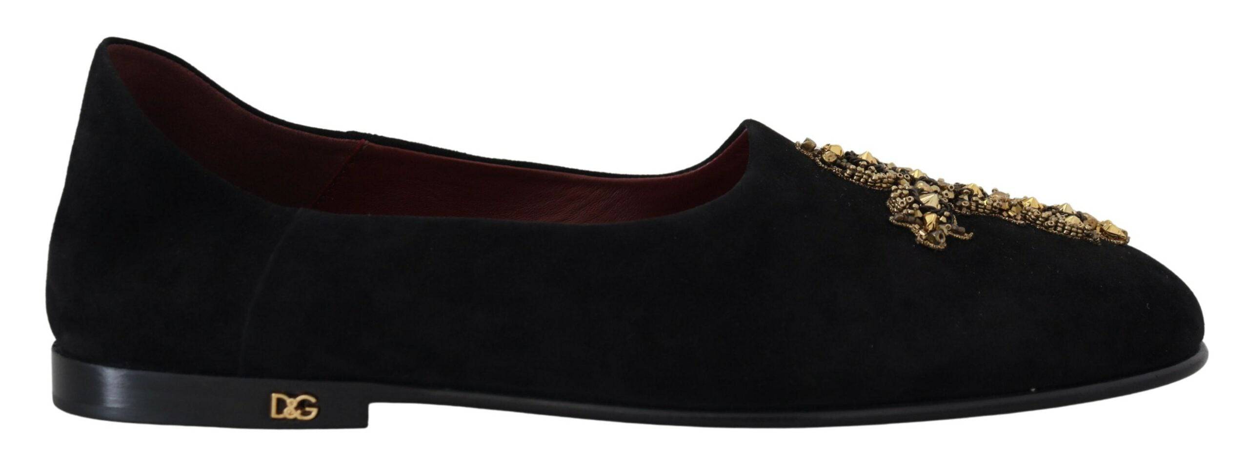 Chaussures mocassins Dolce & Gabbana en daim noir avec détails dorés et croix, slip-on élégants pour homme.